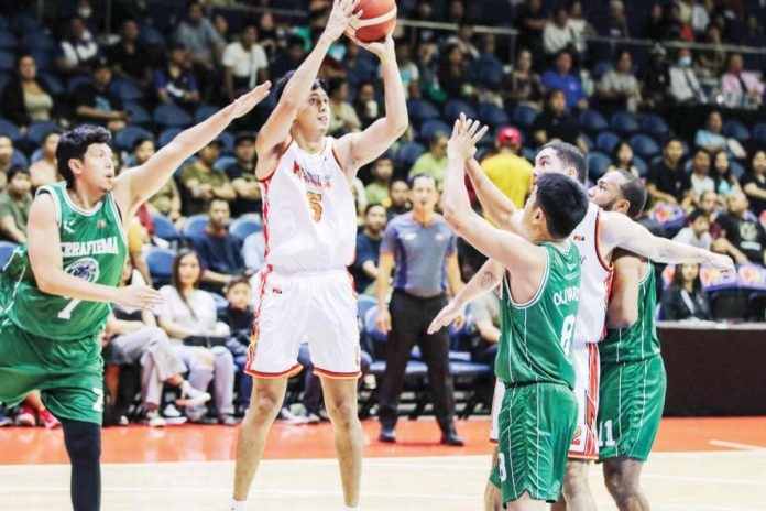 sports_PBA_resized NorthPort Batang Pier’s Allyn Bulanadi pulls up for a shot against the defense of Terrafirma Dyip’s Tommy Olivario. PBA PHOTO