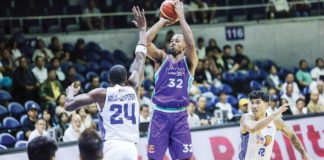 Converge FiberXers’ Scotty Hopson shoots over the defense of TNT Tropang Giga’s Rondae Hollis-Jefferson. PBA PHOTO