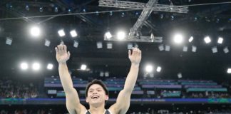 Filipino gymnast Carlos Edriel Yulo raises his hand after winning the vault event of the 2024 Paris Olympics. PHOTO COURTESY OF FIG