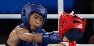 Filipina boxer Aira Villegas unloads a right straight to the face of Turkey’s Buse Naz Çakıroğlu. REUTERS