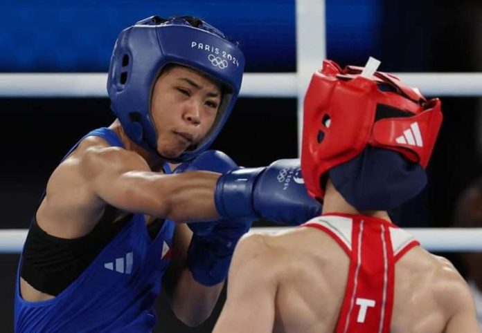 sports_boxer_resized Filipina boxer Aira Villegas unloads a right straight to the face of Turkey’s Buse Naz Çakıroğlu. REUTERS
