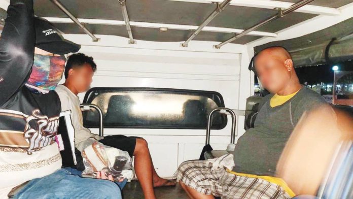 suspects_resized Nilo Guardaya (right) the suspected gunman in the killing of former barangay captain Ernie Poral of Ingore, La Paz, Iloilo City, was arrested on Monday night, August 5, in Guimbal, Iloilo. Police also caught his companion, Jerson Guintapao (left). RMN ILOILO 774/facebook photo
