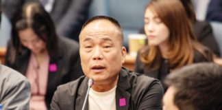 This undated photo shows former Philippine National Police chief Benjamin Acorda Jr. (third from left) and Chinese businessman Tony Yang (second from left), released by the office of Sen. Risa Hontiveros during a Senate inquiry on Sept. 24.