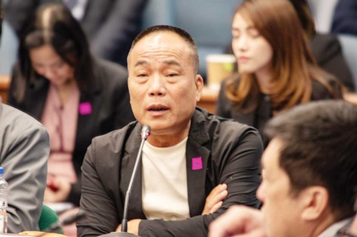 DOJ-(1) This undated photo shows former Philippine National Police chief Benjamin Acorda Jr. (third from left) and Chinese businessman Tony Yang (second from left), released by the office of Sen. Risa Hontiveros during a Senate inquiry on Sept. 24.
