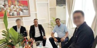This undated photo shows former Philippine National Police chief Benjamin Acorda Jr. (third from left) and Chinese businessman Tony Yang (second from left), released by the office of Sen. Risa Hontiveros during a Senate inquiry on Sept. 24.