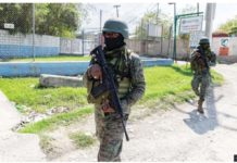 Haiti expands state of emergency to whole country Haitian soldiers stand guard at the entrance to Port-au-Prince international airport after armed gang members exchanged gunfire with police and soldiers around the airport. GETTY IMAGES