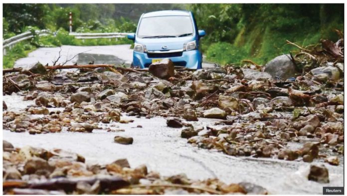 Japan_resized A road is covered with stones due to landslides caused by a torrential rain, in Wajima, Ishikawa Prefecture, Japan. REUTERS