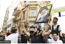 Leader of terror group Hezbollah killed in Israeli airstrike A group in Beirut, Lebanon carry a photo of slain Hezbollah leader Hassan Nasrallah and chant slogans. GETTY IMAGES