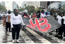 Still no justice for 43 missing Mexico students Protesters in Mexico City carrying a banner commemorating the 43 missing student teachers
