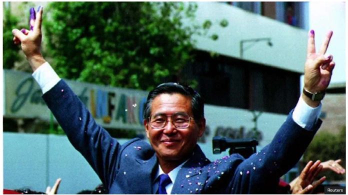 Peru_resized_resized Peruvian President Alberto Fujimori gives the victory sign with ink-stained fingers after voting in the nation's first-ever constitutional referendum, October 31, 1993. Fujimori was in power from 1990 until 2000. REUTERS