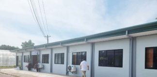 Sugar Regulatory Administration Board Member Dave Sanson inspects the newly constructed P6-million beneficial micro-organisms laboratory. SRA PHOTO