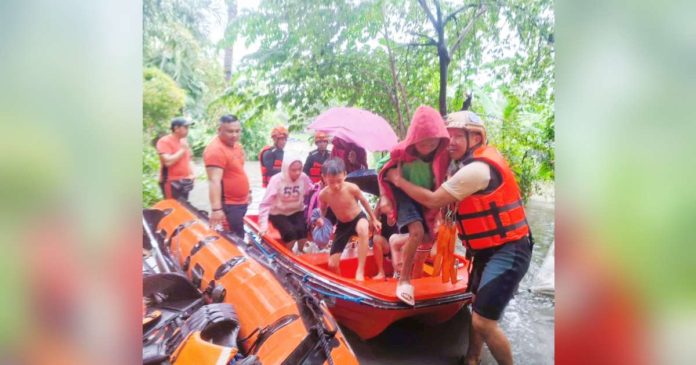 TS ferdie in negocc pic_superimposed Personnel of the Bacolod City Disaster Risk Reduction and Management Office, Philippine Coast Guard and Philippine Army rescued residents from flood waters in Barangay Pahanocoy on Saturday, Sept. 14, 2024. BACOLOD CDRRMO PHOTO