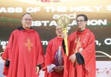 Rev. Fr. Arnel S. Dizon installed as new president of University of San Agustin – Iloilo Fr. Arnel S. Dizon, OSA (right), was installed as the ninth president of the University of San Agustin. Photo shows the immediate past president, Fr. Frederick C. Comendador, OSA (left), handing over the university mace to Fr. Dizon.