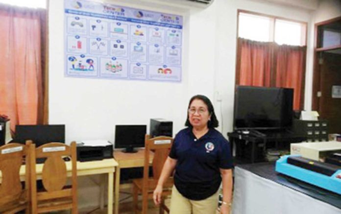 antique-public-library-(1) Antique Provincial Librarian Grace Magullado prepares for the setting up of a hub for the Technology for Education, Employment, Entrepreneurs and Economic Development program at the provincial library at the old capitol in San Jose de Buenavista town on Monday, Sept. 23, 2024. PNA PHOTO BY ANNABEL CONSUELO J. PETINGLAY
