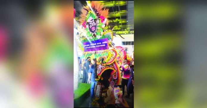 ati-atihan fest copy_superimposed Five of the winning Ati-Atihan contingents in the Kalibo Sadsad Ati-Atihan contest highlighted their energetic street dancing, colorful costumes and the beating of drums during the 35th Philippine Travel Mart at SMX Convention Center. SCREENGRABBED FROM PHILIPPINE TRAVEL MART FACEBOOK VIDEO