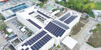The installation of the 400-kilowatt capacity solar power system on the rooftop of the Bacolod City Government Center began in July this year. It is expected to be operational by next month. PHOTO COURTESY OF XFM BACOLOD NEWS AND PUBLIC SERVICE AUTHORITY