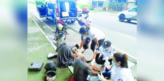 Personnel of the Bacolod City Disaster Risk Reduction and Management Office applied first aid to three victims of a motorcycle accident in the city’s circumferential road on Sept. 1, 2024. BACOLOD CITY DRRMO PHOTO