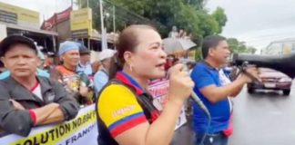 Kabakod-Knetco president Lilian Sembrano (left) and BACOD-Manibela president Rudy Catedral lead the protest without a permit outside a hotel on Lacson Street, Bacolod City on Wednesday, Sept. 18, 2024. CONTRIBUTED PHOTO/PNA