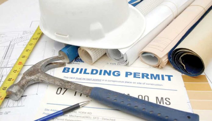 The decline in building permit applications in June this year was partly attributed to high interest rates which led to more expensive costs of construction, weighing on the demand for building projects. INQUIRER.NET FILE / STOCK