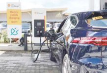 Rules requiring EV charging infra in gasoline stations out next year Republic Act 11697, or the Electric Vehicle Industry and Development Act, mandates an owner of a gasoline station to install, operate, or maintain a commercial-use charging station on its premises. Photo shows an electric vehicle charging facility at a gasoline station in SLEX Mamplasan, Laguna. PHOTO COURTESY OF SPEED.PH