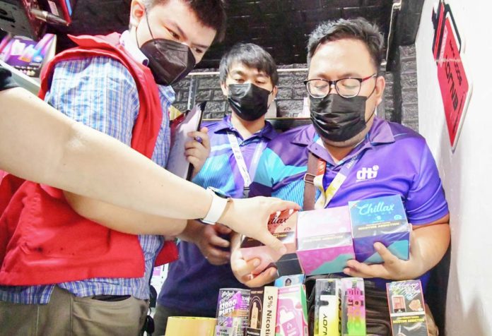 customs-1 The Department of Trade and Industry confiscates vape products with flavors and packaging that can entice minors during an inspection in a store in Manila. MARK DEMAYO/ABS-CBN NEWS FILE PHOTO