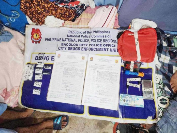 drug_peddlers_1_resized Ten plastic sachets of suspected shabu valued at around P578,000 were recovered from a high-value target and two other drug suspects in an anti-illegal drug operation in Barangay Villamonte, Bacolod City on Monday night, September 2. BCPO PHOTO