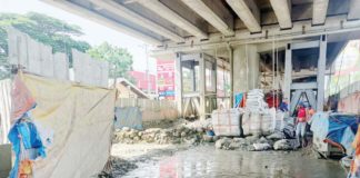 Motorists and residents should brace for continued traffic congestion beneath the Ungka flyover in Barangay Ungka II, Pavia, Iloilo. The Department of Public Works and Highways - Region 6 says it will fail to meet its November 2024 deadline for a complete flyover rectification work and full reopening. AJ PALCULLO/PN