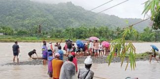 Due to heavy rains, rising waters in Ypayo River in Patnongon, Antique prompted authorities to prohibit students and local residents from crossing. Stranded individuals sought temporary refuge at Igburi National High School. PHOTO COURTESY OF THE MUNICIPALITY OF PATNONGON/FB