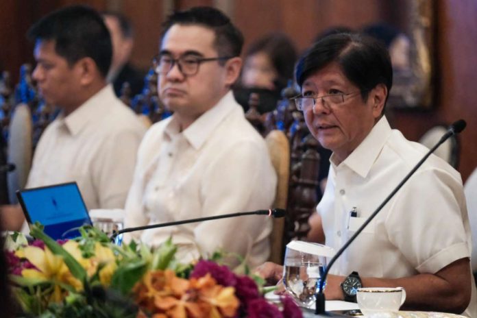 marcos_confident_resized President Ferdinand Romualdez Marcos Jr. (right) presides over the sectoral meeting on Managing Food and non-food inflation on Tuesday, Sept. 24, 2024 at the State Dining Room of Malacañan Palace, Manila. YUMMIE DINGDING / PPA POOL