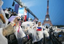 Direct Paris-Manila flights favorable for PH tourism The mounting of direct Manila-Paris flights starting December 8, 2024 would enhance ease of travel and provide the much-needed connectivity to Europe. Photo shows attendees posing with a Philippine flag in the stands at the Trocadero during the opening ceremony of the Paris 2024 Olympic Games in Paris, France on July 26, 2024, with the Eiffel Tower in the background. OLI SCARFF, AFP