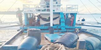 Western Visayas maritime police have taken custody of this fishing vessel that was allegedly involved in the illegal petroleum trade. The vessel and its eight crew members were intercepted in Carles, Iloilo on Sept. 26, 2024. REGIONAL MARITIME UNIT 6 PHOTO