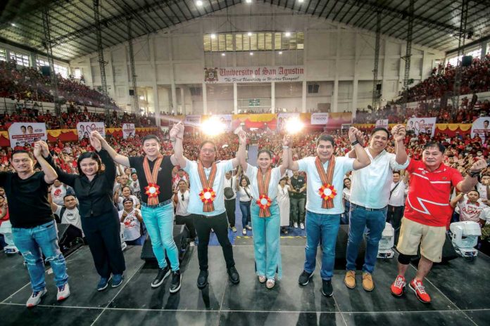 pn2_resized Iloilo City Lone District’s Congresswoman Julienne “Jam-Jam” Baronda (5th from left) led the GUGMA FMR Scholarship General Assembly at the University of San Agustin gymnasium in Iloilo City on Sunday, Sept. 29, 2024. Also present were (from left) former Public Safety and Transportation Management Office head James Conlu, former city councilor Sheen Marie Mabilog, Cong. Edvic Yap, former Iloilo City mayor Jed Patrick Mabilog, ACT-CIS Party-list’s Cong. Erwin Tulfo, Pastor Stanley “Big Bro” Flores, and City Councilor Urminico “Doc Nick” Baronda Jr.
