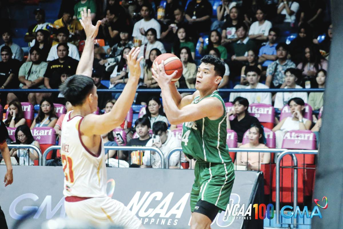 sports CSB College of St. Benilde Blazers’ Allen Liwag looks to pass the ball while being bothered by a University of Perpetual Help Altas’ defender. PHOTO COURTESY OF NCAA/GMA SPORTS