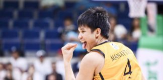 Capiznon Christian Manaytay of University of Santo Tomas Growling Tigers gestures after scoring against University of the East Red Warriors. UAAP PHOTO