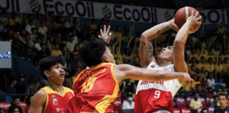 Ilonggo John Bryan Sajonia of San Beda University Red Lions attacks two San Sebastian College Golden Stags’ defenders. PHOTO COURTESY OF NCAA/GMA SPORTS