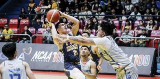 Negrense Lance Benitez of Jose Rizal University Heavy Bombers tries to score against an Arellano University Chiefs defender. PHOTO COURTESY OF NCAA/GMA SPORTS