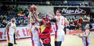 San Miguel Beermen’s Jordan Adams tries to score against the defense of Negrense Raul Soyud and Jason Perkins of Phoenix Fuel Masters. PBA PHOTO