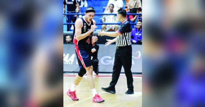 sports Santos 1_superimposed Colegio de San Juan de Letran Knights’ Kevin Santos reacts after knocking down the go-ahead basket against the College of St. Benilde Blazers. PHOTO COURTESY OF NCAA/GMA SPORTS