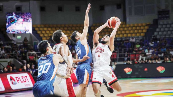 sports_Ginebra_resized Barangay Ginebra San Miguel Kings’ Rhon Jhay Abarrientos attempts to score against the defense of Ilonggo Anjo Caram of Meralco Bolts. PBA PHOTO