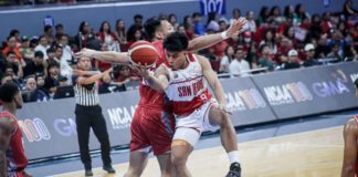 Ilonggo John Bryan Sajonia of San Beda University Red Lions goes for a tough basket against a Lyceum of the Philippines Pirates defender. PHOTO COURTESY OF NCAA/GMA SPORTS