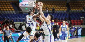 Converge FiberXers’ Jalen Jones and Justin Arana grabs the rebound. PBA PHOTO