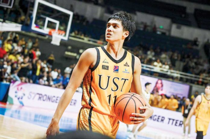 sports_Padrigao_1_resized Rence “Forthsky” Padrigao reacts after knocking down crucial baskets in University of Santo Tomas Growling Tigers’ tight win over National University Bulldogs. UAAP PHOTO