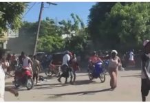70 killed in Haiti gang ‘massacre’ People could be seen fleeing violence on motorbikes and on foot in Haiti. AP