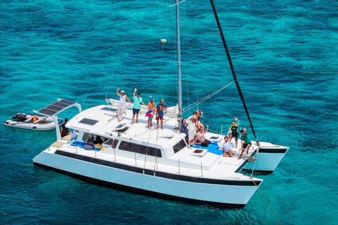 LUTP A shot of BingoPlus and its VIP players on a private yacht tour in El Nido, Palawan.