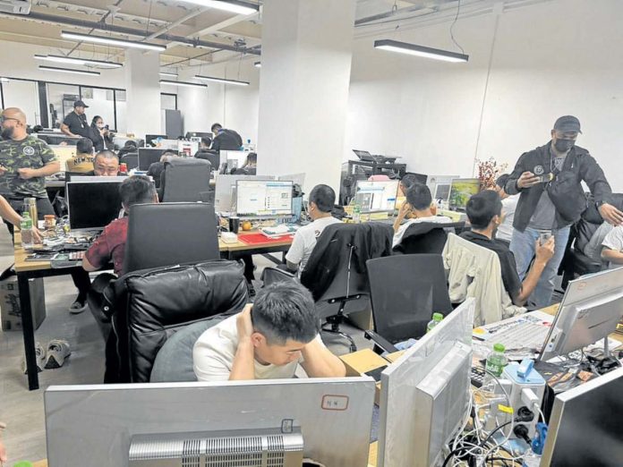 Love_scam_POGO_1_resized Authorities discover a Philippine offshore gaming operator, still operating and well-staffed, in a raid in Pasay City on Oct. 4, despite the ban ordered by President Ferdinand Marcos Jr. on July 22, 2024. Photo from Presidential Anti-Organized Crime Commission