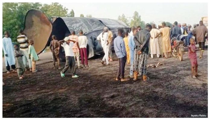 Nigeria_1_resized People gather at the scene of a fuel tanker accident in Majia, Nigeria. ISYAKU RABIU