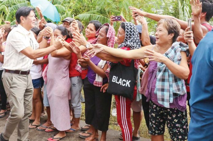 PBBM-1 President Ferdinand R. Marcos Jr. on Saturday visited the victims of Severe Tropical Storm Kristine in Bula, Camarines Sur, to personally check on their condition and provide cash assistance to the needy.