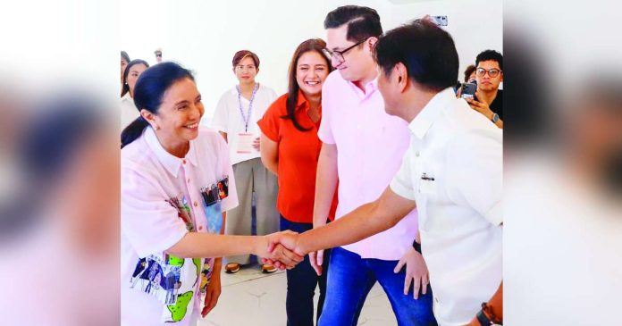 PBBM 1_superimposed President Ferdinand R. Marcos Jr. meets with former Vice President Leni Robredo at the sidelines of the inauguration of the Sorsogon Sports Arena on (Oct. 17, 2024. Robredo was invited by Senate President Francis Escudero to welcome Marcos on behalf of the Bicol Region. Photo courtesy of PCO/SP Escudero