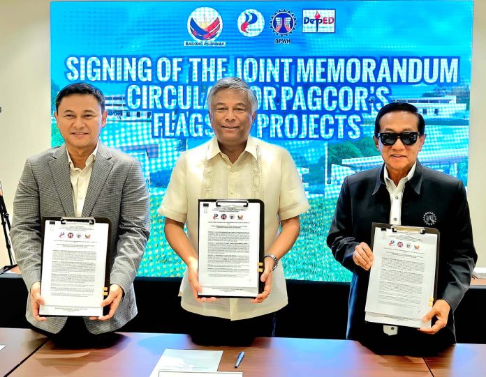 Photo-1 (From left) DepEd Secretary Sonny Angara, PAGCOR Chaiman and CEO Alejandro Tengco, and DPWH Secretary Manuel Bonoan show the signed memorandum circular formalizing the three agencies' new collaborative undertaking.