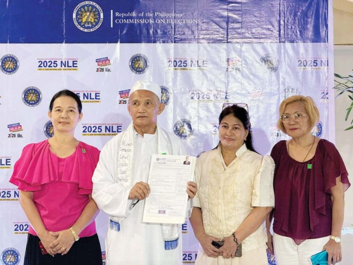 President's_uncle_1_resized Senate aspirant Eric Negapatan was accompanied by his relatives when he filed his certificate of candidacy for the 2025 midterm elections. PHOTO COURTESY OF DZRH